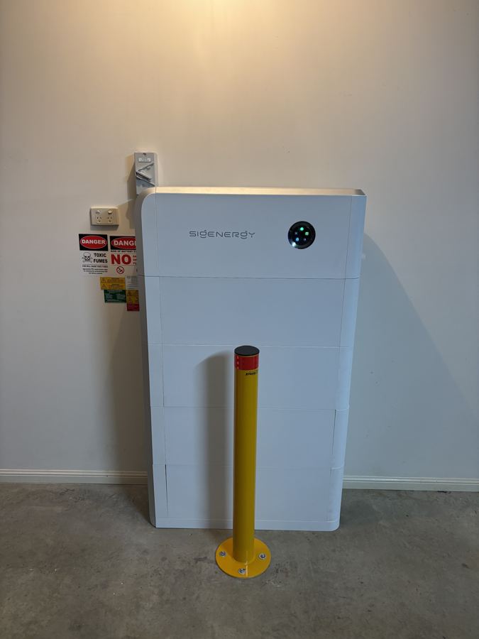 Sigenergy home battery installed on a garage wall