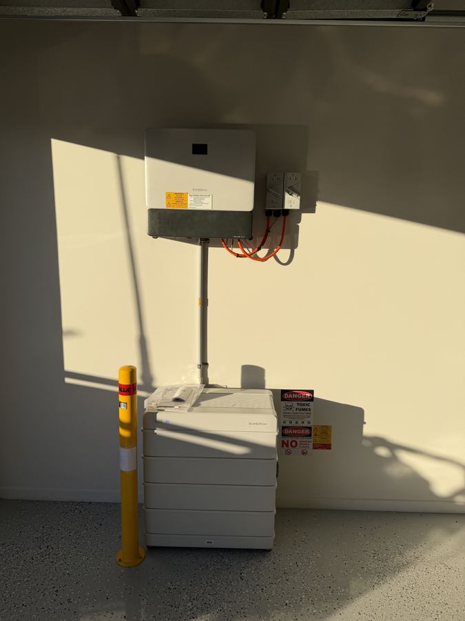 Solar inverter and battery unit installed on a wall